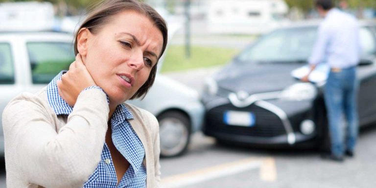 woman injured in a car accident requiring representation from a personal injury attorney
