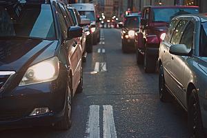 Cars lined in traffic on street