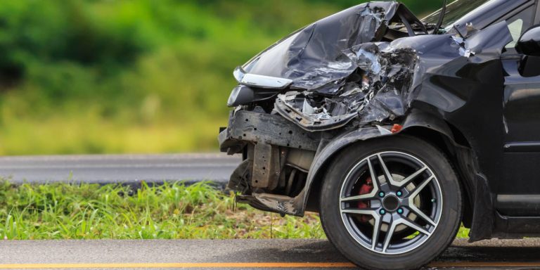 Damaged car after a road accident. There are limitations on personal injury claims arising from automobile accidents